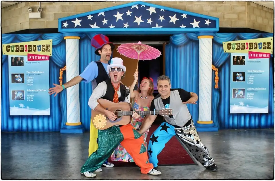 Cubbyhouse children's band posed in front of its travelling stage